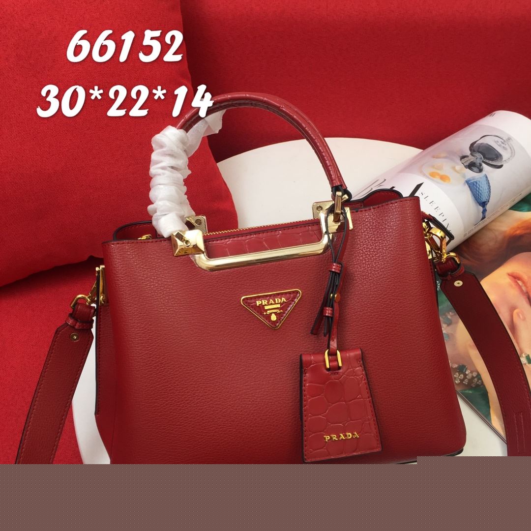 Pra*a top handle bags